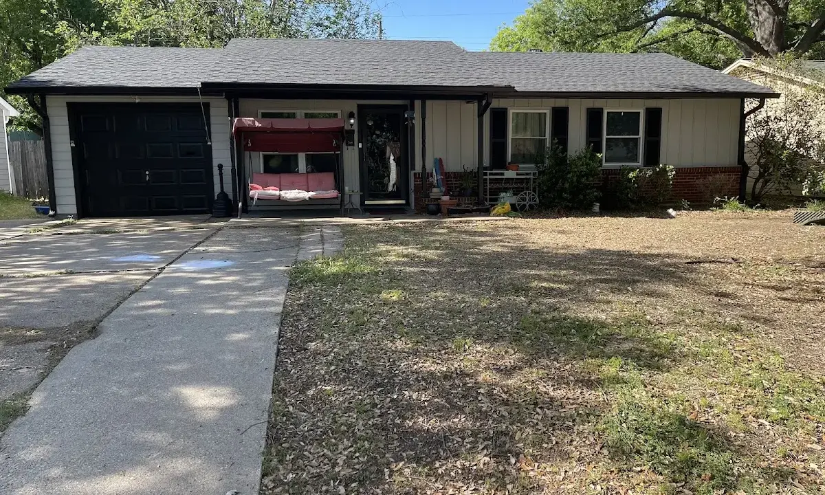 Asphalt Shingle Roof Repair crew at work on a residential roof in Largo